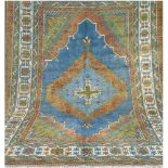 Teppich, mehrfarbig, mit zentralem Medaillon, Kanten leicht belaufen, Reinigung empfohlen,320x210