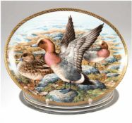 3 Teller und ovale Platte, 2 Teller mit gedruckten Jagdmotiven, 1 Teller mitastronomischer Uhr,