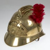 Feuerwehrhelm, Frankreich um 1895, Messing, frontseitig Emblem, bez. Sapeurs Pompiers,seitl. roter