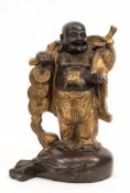 Happy Buddha-Hotai-Buddha, China 19. Jh.,Bronze, partiell braun patiniert, auf einemGeldsack