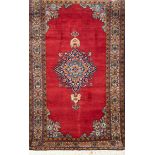 Teppich, Persien, rot-/ blaugrundig, mit zentralem Medaillon und floralen Motiven, guterZustand,