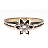 Ring, 585er WG, besetzt mit Brillant-Solitär von ca. 0,22 ct. in blütenförmiger Fassung,ges. 4,57 g,