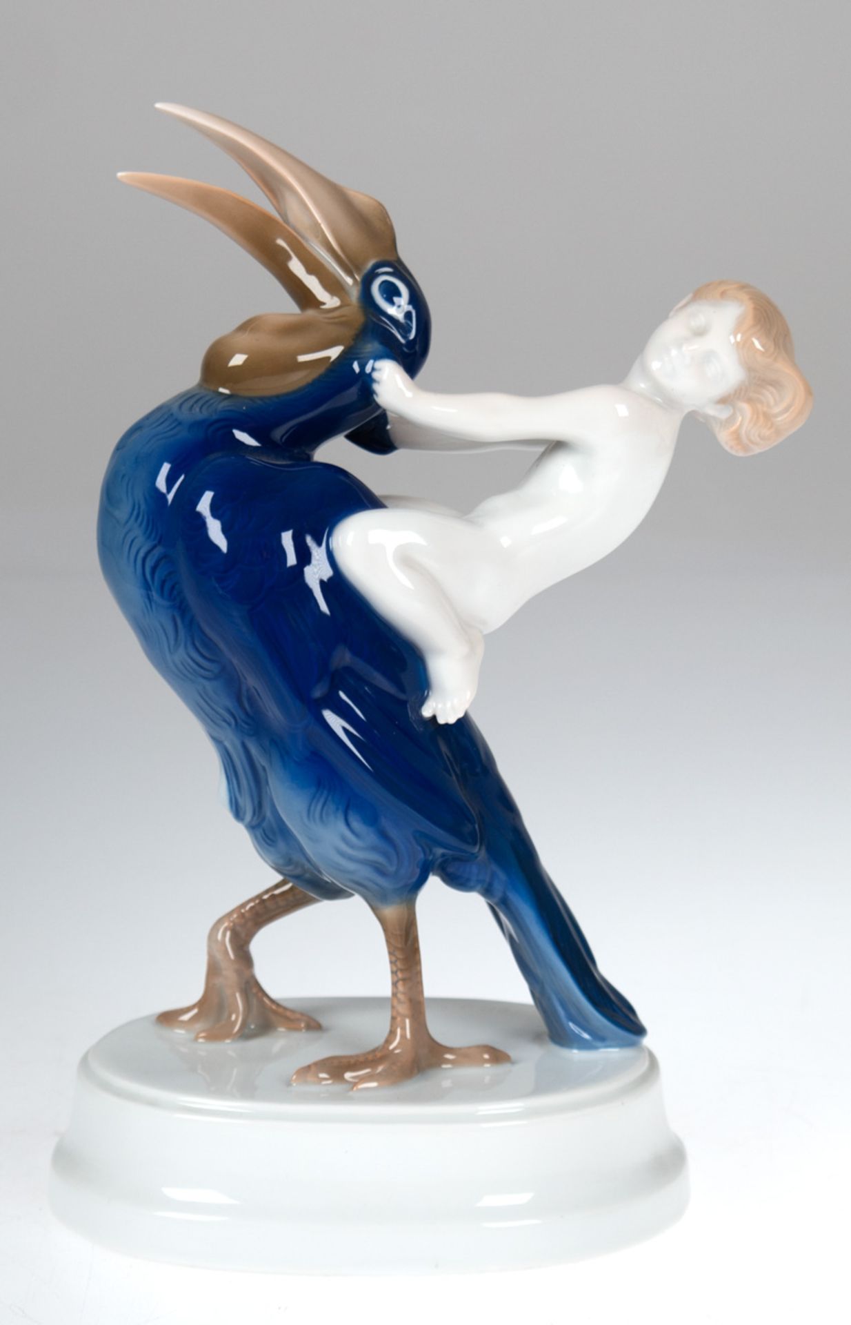 Rosenthal-Figur "Putto auf Marabu", polychrom bemalt, H. 24 cm