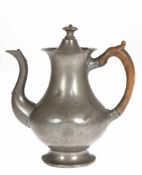 Bergische Kaffeekanne, um 1850, Zinn, punziert, Holzhenkel rep., gedellt, H. 21 cm