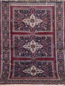 Orientteppich, Pakistan, rotgrundig mit durchgehendem Muster, 1 Hälfte sowie 3 Kanten belaufen,