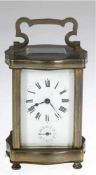 Reiseuhr mit Wecker, Frankreich um 1900, 5-seitig verglastes Messinggehäuse mit obiger