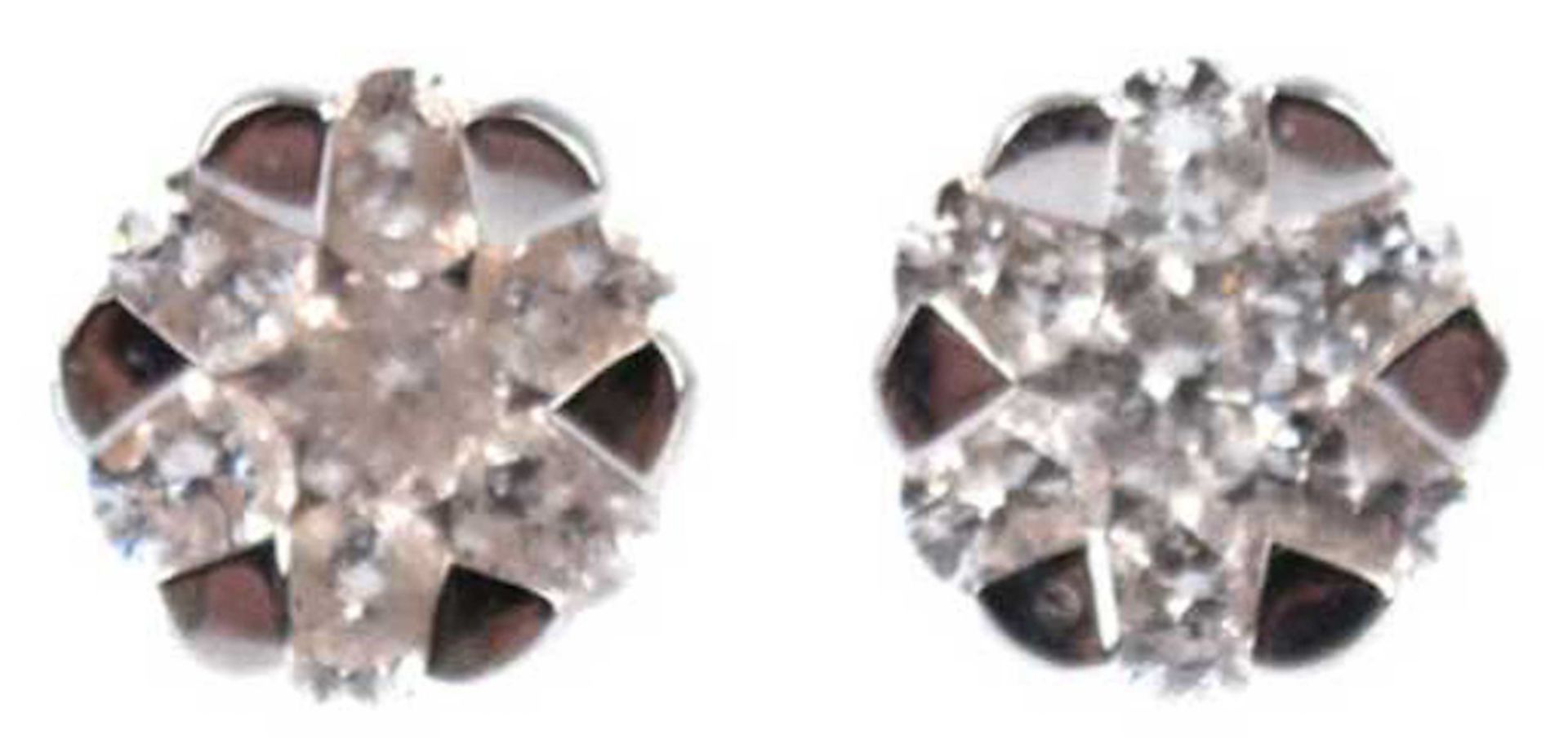 Paar Ohrstecker, 585 WG, besetzt mit je 7 kleinen Diamanten, Dm. 0,6 cm