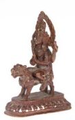 Figur "Manjushri Bodhisattva auf Wildkatze", Bronze, Tibet Nepal, braun patiniert, H. 9,5cm