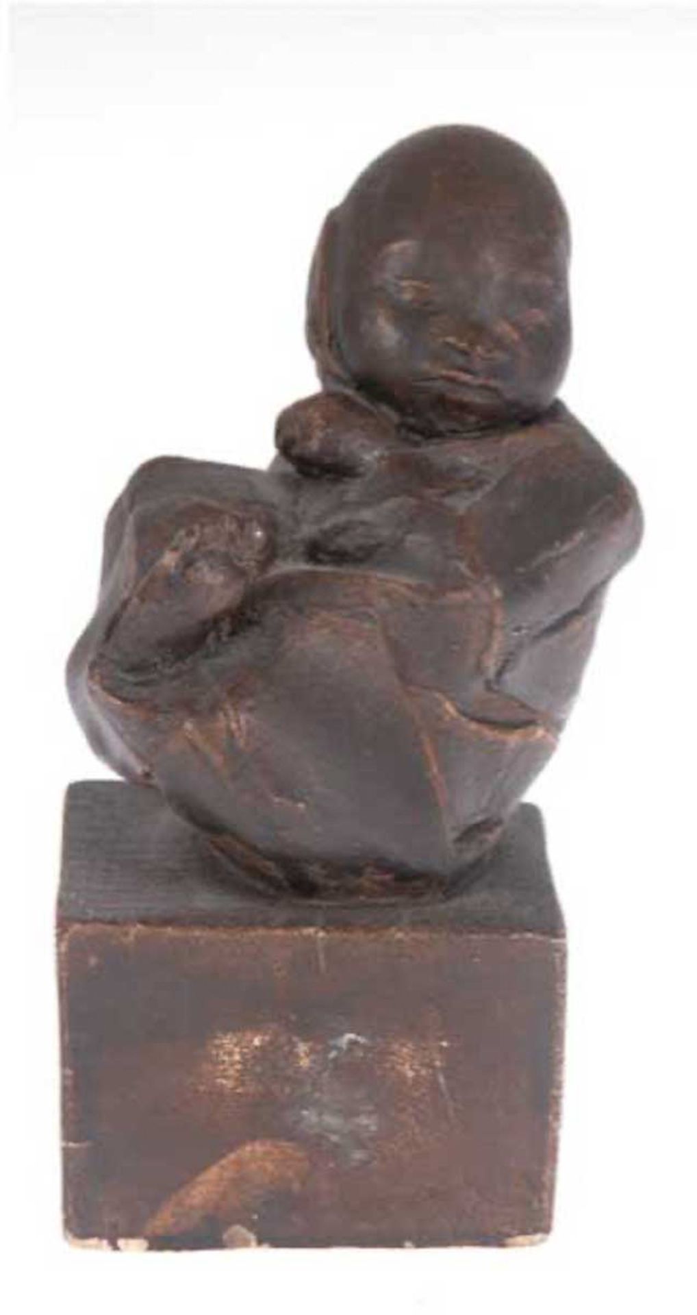 Figur "Kind in einer Decke gewickelt", Kunstgußmasse, auf quadratischem Sockel, H. 13,5cm