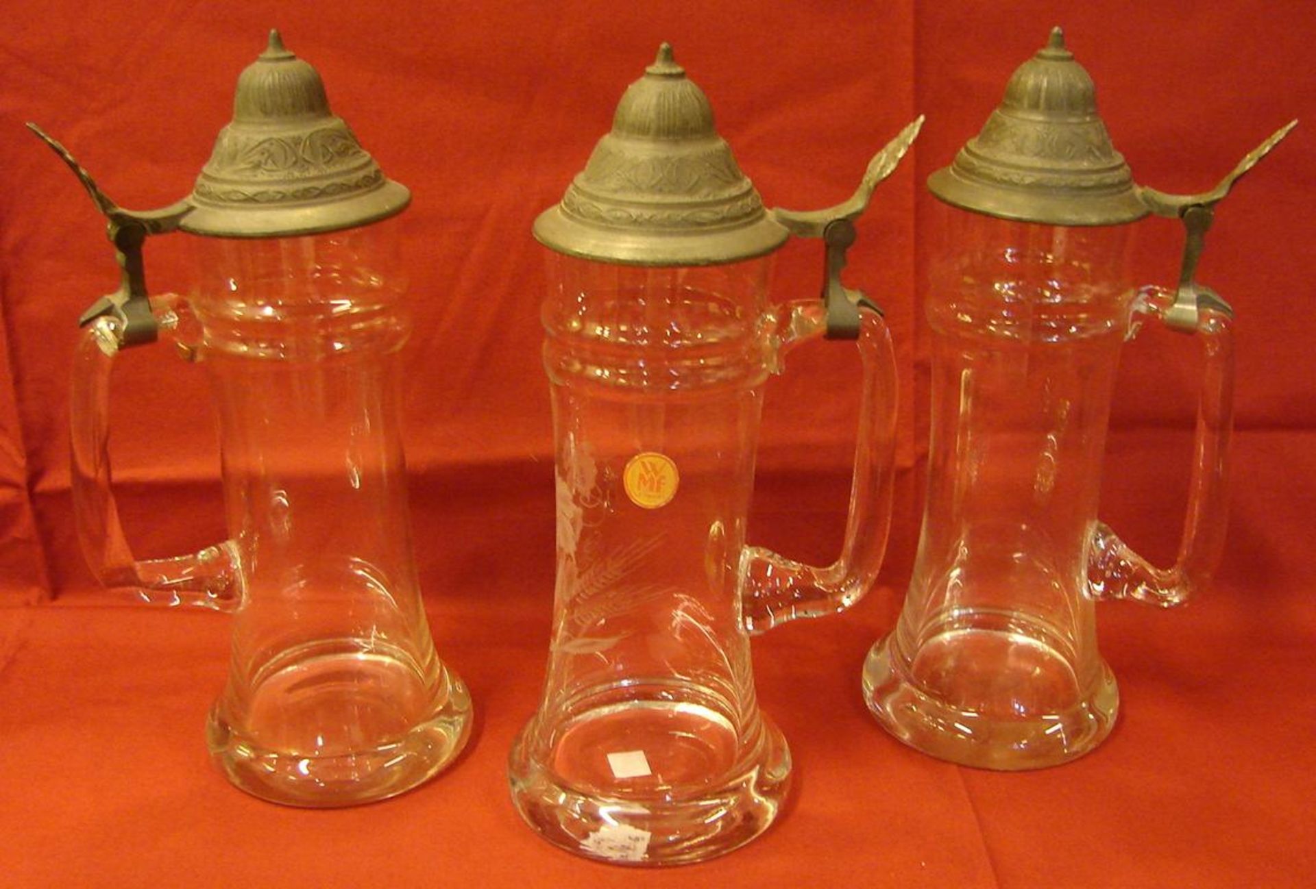 3 Bierkrüge, WMF, farbloses Glas, mit Zinndeckel mit Daumenrast, Etikett WMF Germany, je H. ca. ...