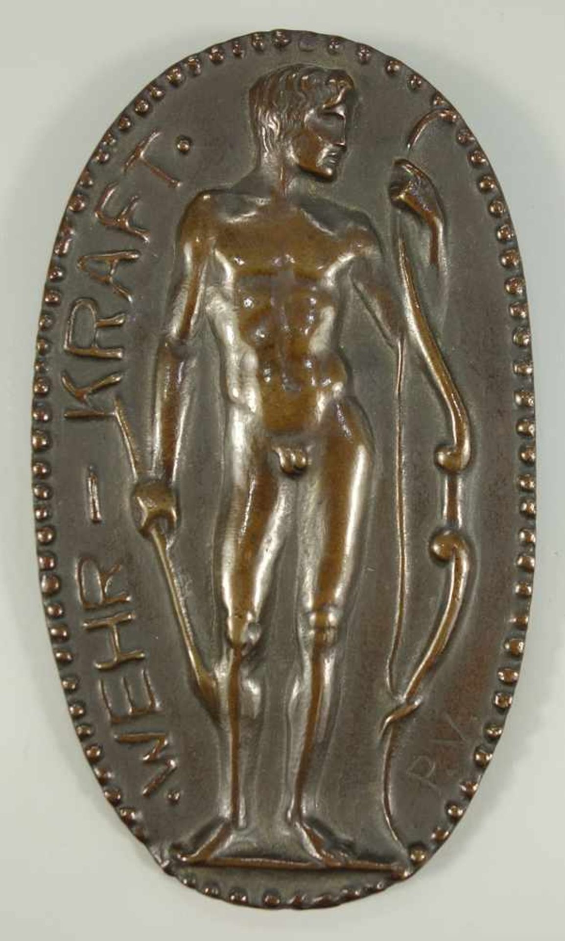 Bronzeplakette "WEHR-KRAFT", monogrammiert P.V., um 1910/20, ovale Platte mit Punktreliefrand,