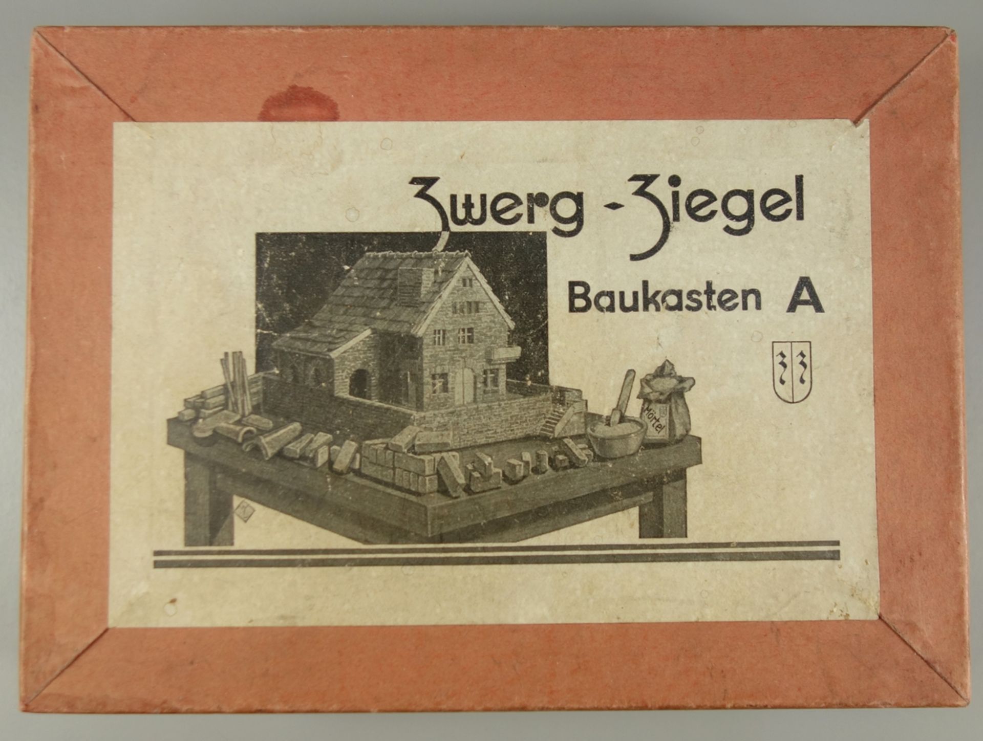 "Zwerg-Ziegel", Baukasten A, Erich Richter, um 1930/40, gebrannter Ton, unglasiert, mit Bauanleitung