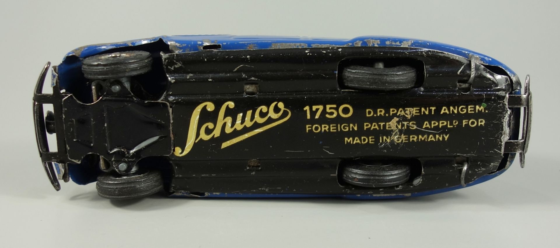 Schuco, blaues Garagen-Auto mit Uhrwerkmotor, Modell 1750, 1950er Jahre, Blechspielzeug, L.14,5cm, - Bild 2 aus 2