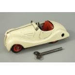 Schuco, Akustico 2002, Cabrio, 1950er Jahre, Blechspielzeug, handlackiert, cremeweiß, mit Uhrwerk,