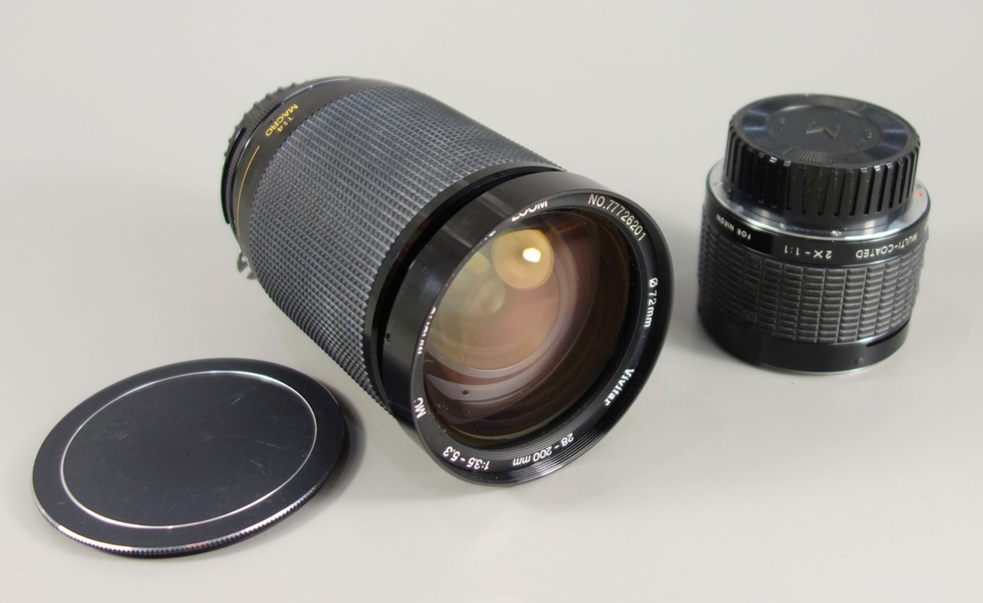 Vivitar Macro Focusing Zoom 1:3,5-5,3/28-200mm, Serien-Nr. 77726201 und Sigma Tele-Macro Multi