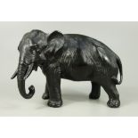 Elefant, Japan, 20.Jh., H.12cm, Spritzguss, dunkel patiniert, am Baucn reliefierter Aufdruck "Made