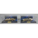 2 Minichamps -Modelautos: Aston Martin DBS, limitierte James Bond Collection, G