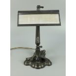 Schreibtischlampe mit Pierrot, um 1930, Spritzguss bronziert, Sockel mit Laute