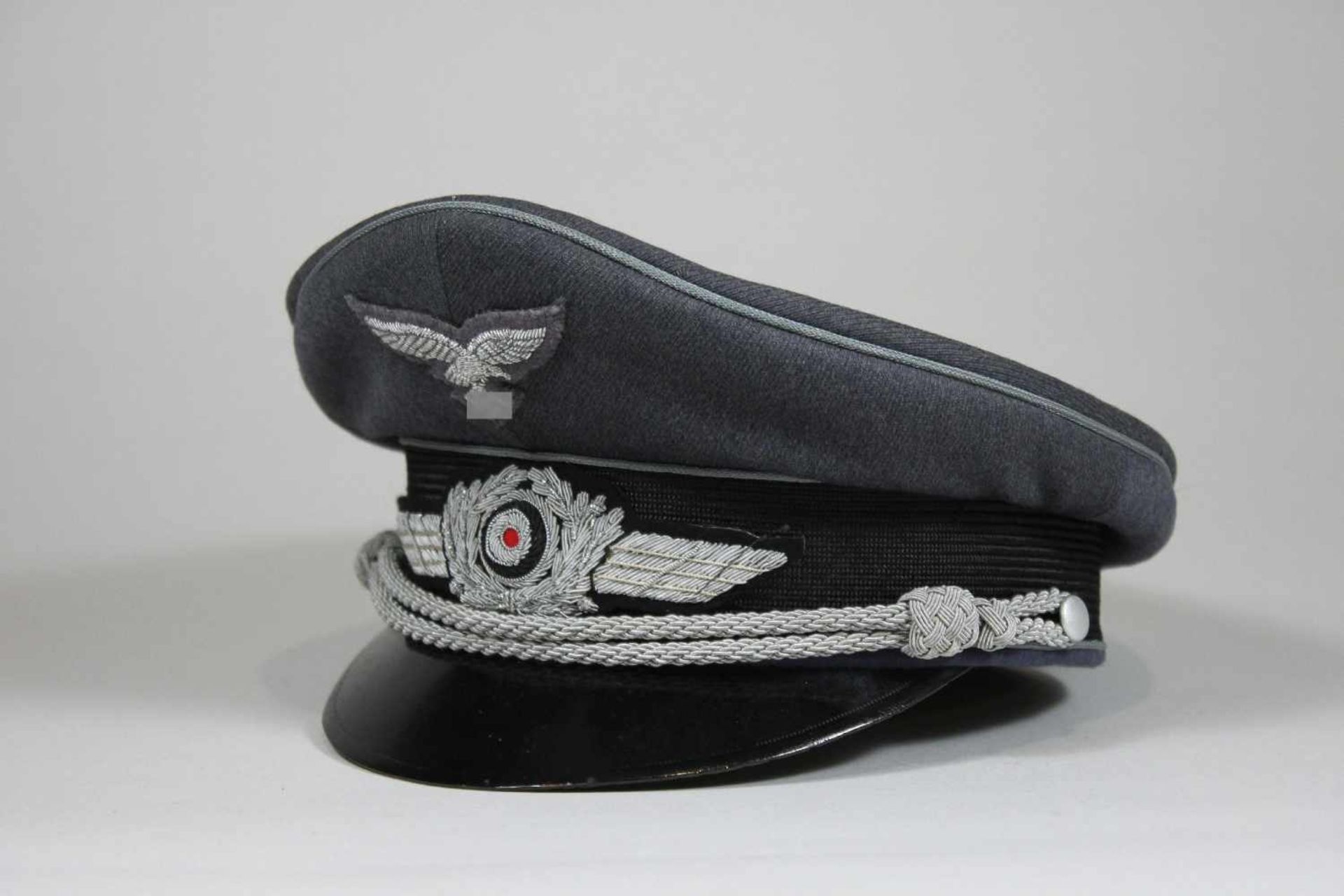 Luftwaffe Schirmmütze für Offiziere, Hersteller: Erel Patent Stirnschutz, ungetragen, mit leichten
