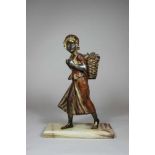 Mädchen mit Weinkorb, Metallfigur auf Marmorplinthe, H.: 31 cm.