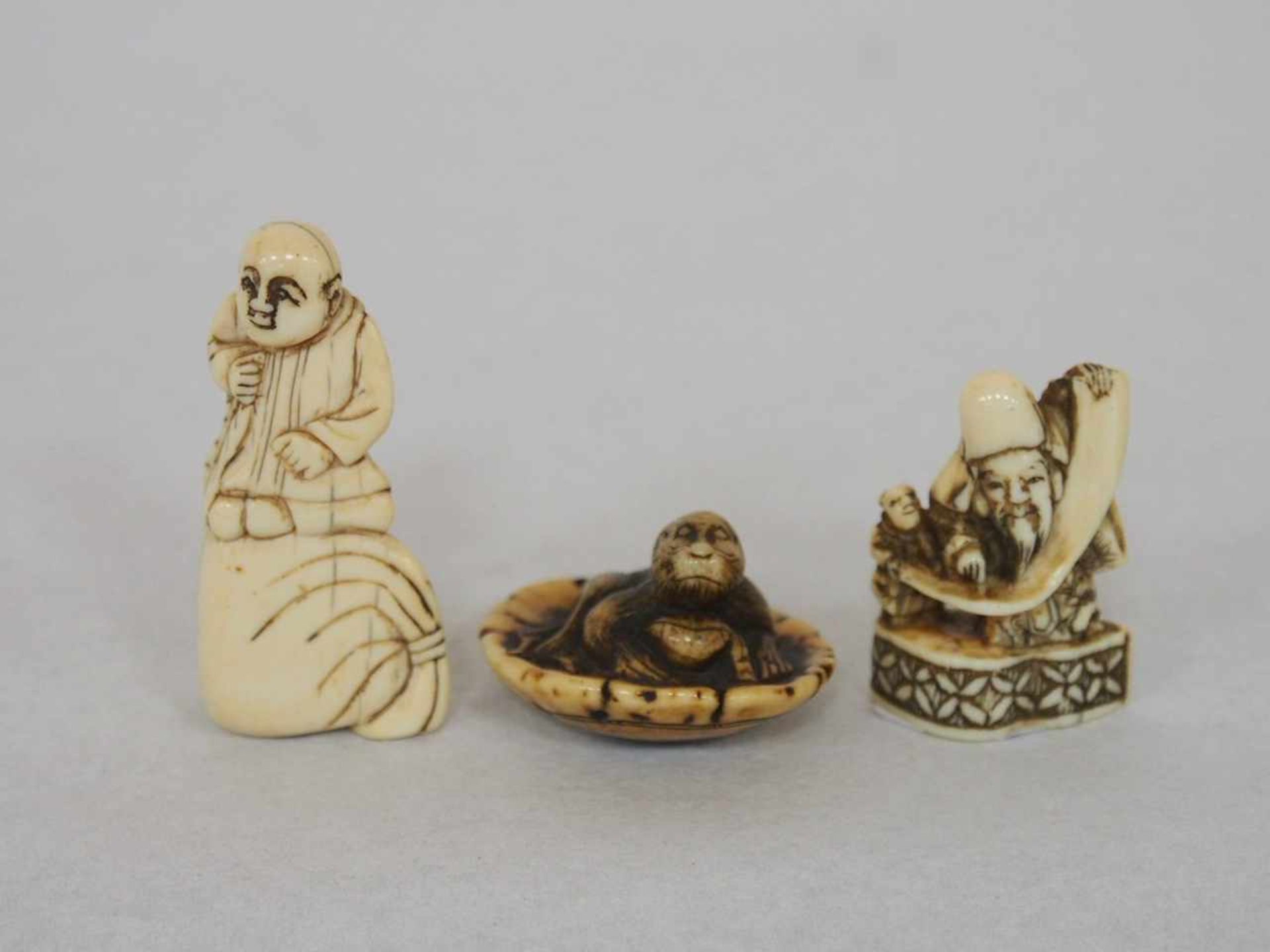 Drei Netsuke