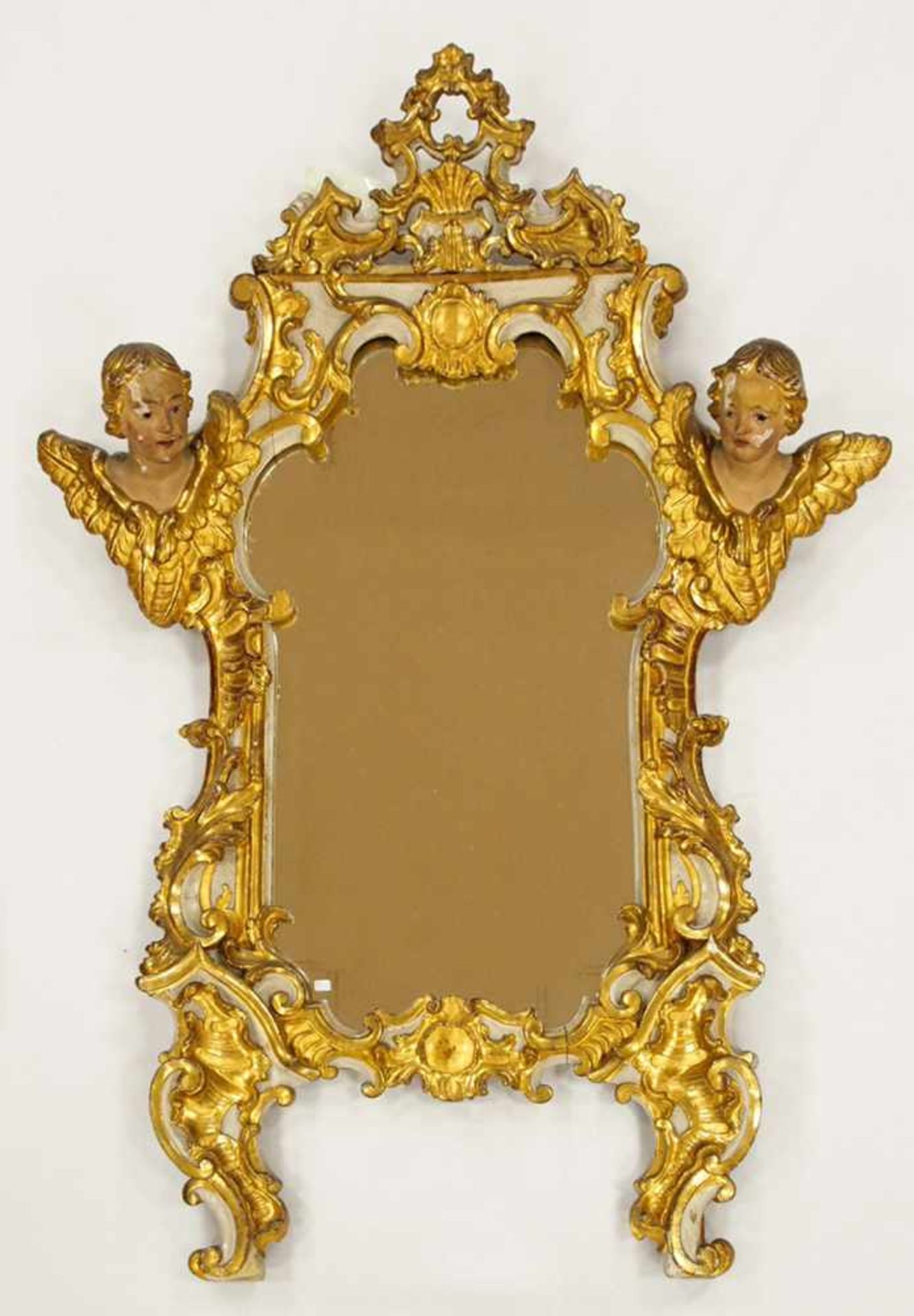SpiegelRahmen, Holz, geschnitzt, geflügelte Puttenköpfe, ältere Fassung und Vergoldung, darunter