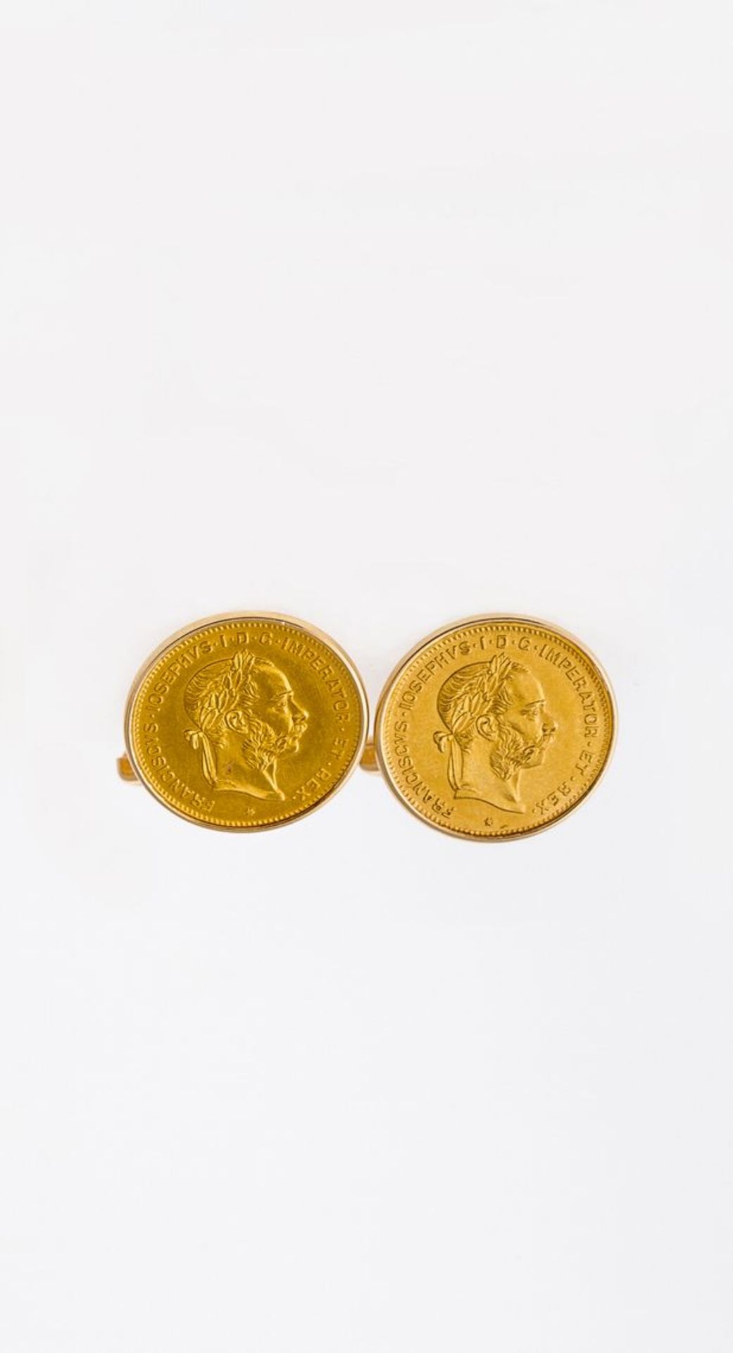 Manschettenknöpfe mit GoldmünzenGG, 585. Ein Paar. In glatter Rahmenfassung jeweils eine 1-Dukaten-
