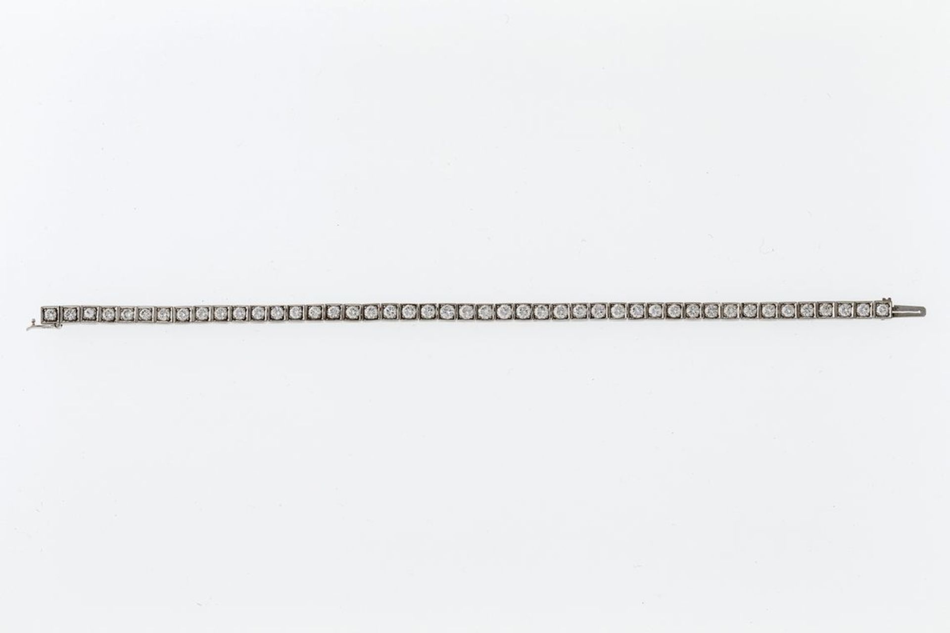 BrillantarmbandWG, 750. Tennisarmband aus quadratischen Gliedern, ausgefasst mit 45 Brillanten von