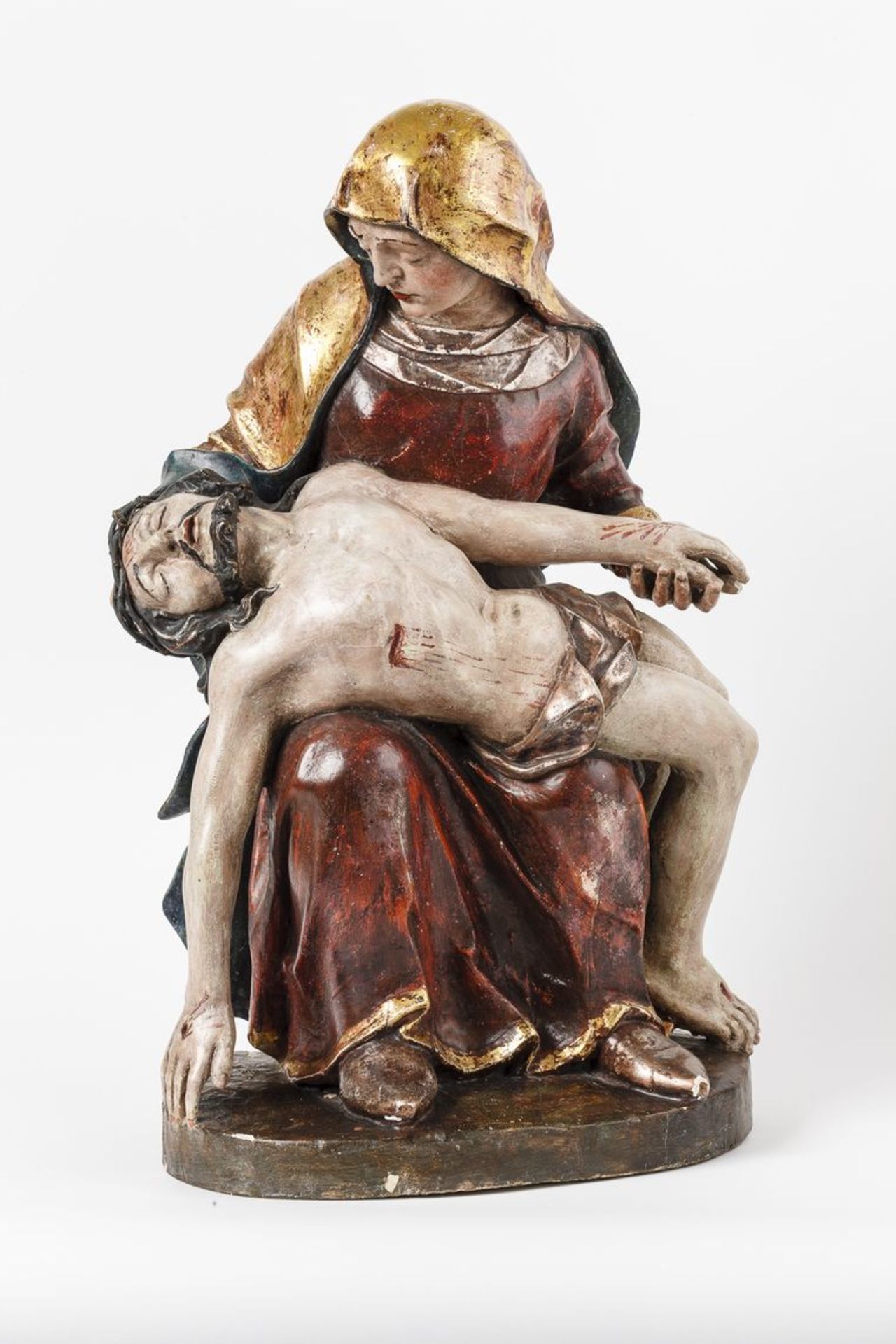 PietàSkulptur aus Lindenholz, dreiviertelrund geschnitzt, rückseitig abgeflacht, polychrom