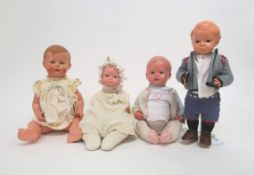 Vier diverse Puppen