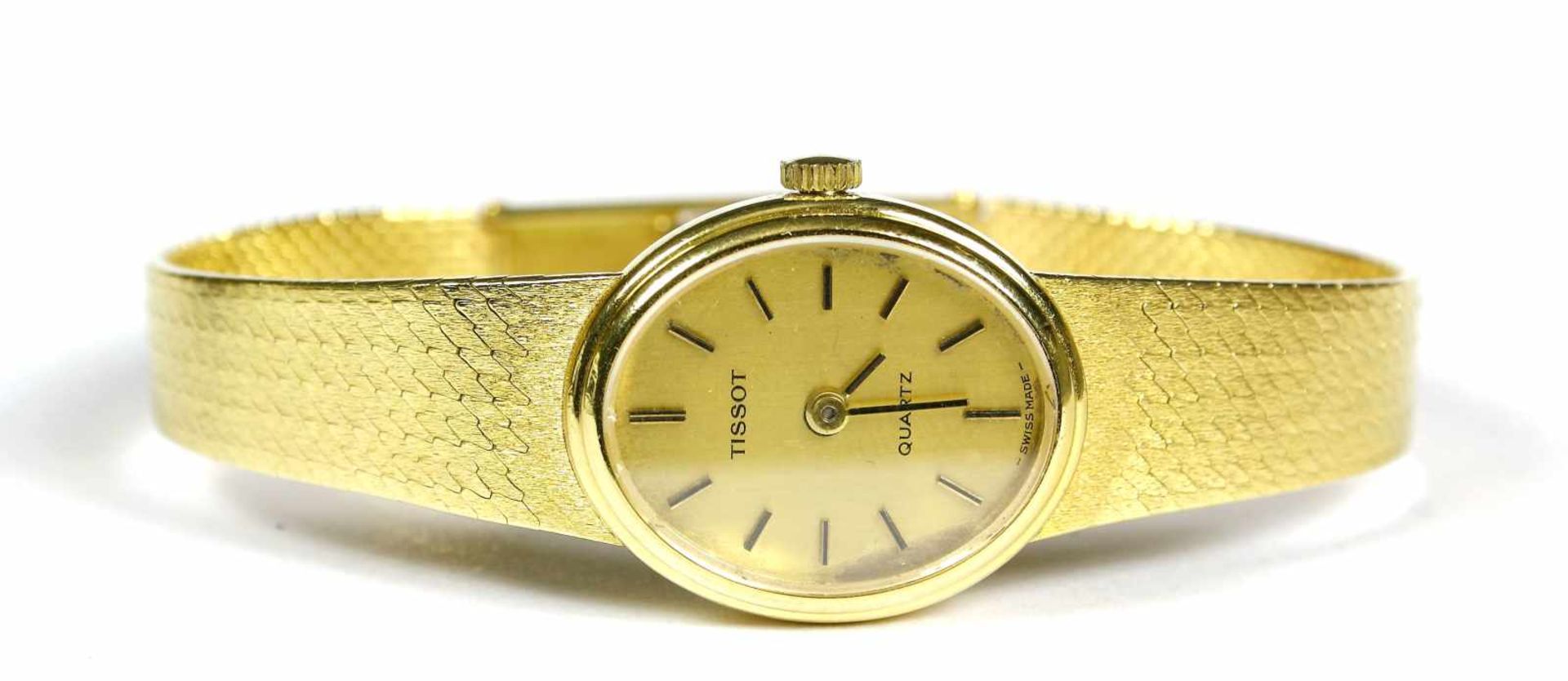 Uhr, Damenarmbanduhr, Tissot Quartz, 750er GG. mit Ansatzband