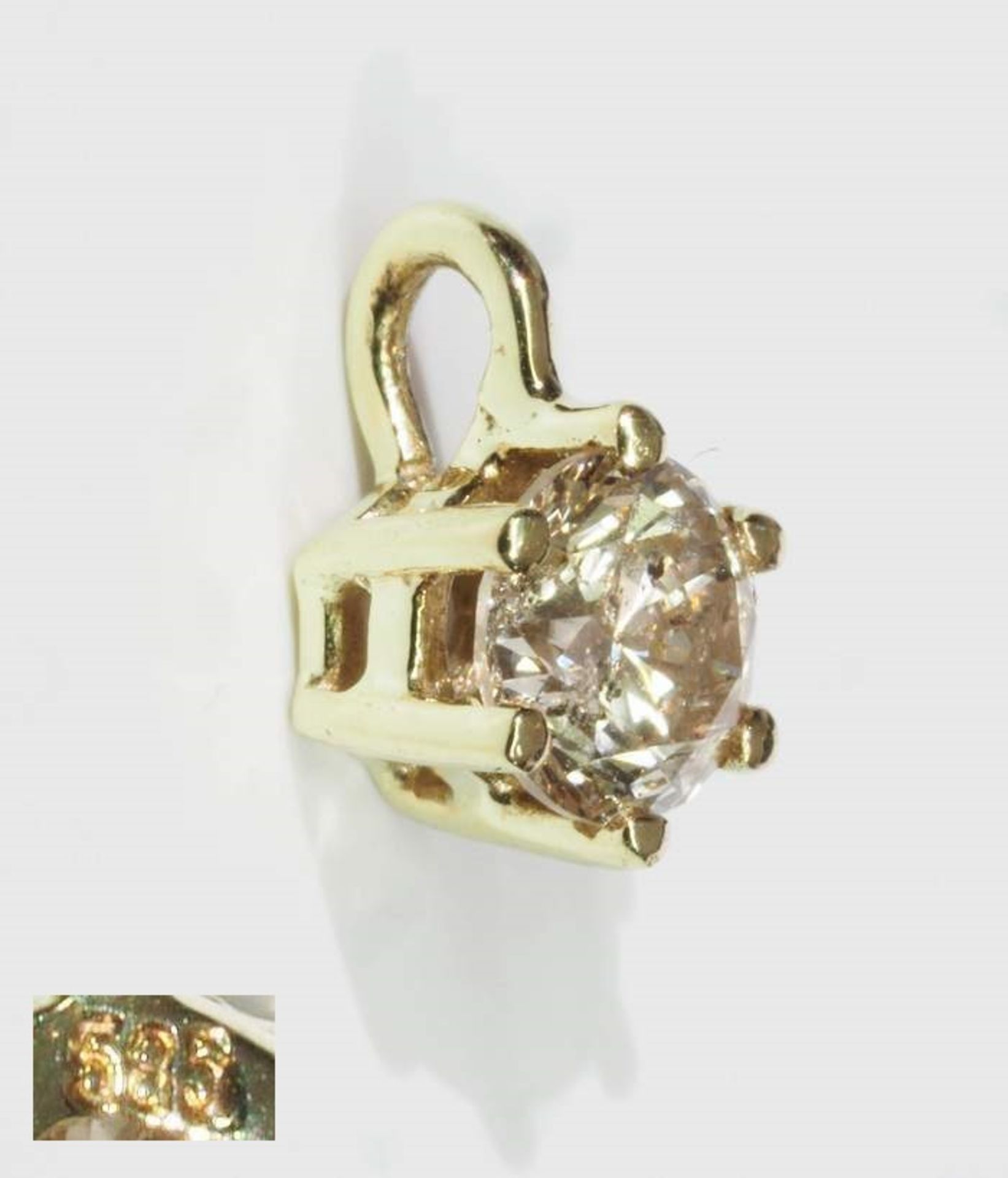 Anhänger.Anhänger, 585er Gelbgold, mittig gefaßt Brillant ca,. 0,50 ct light brown/p1. Länge ca, 8,5