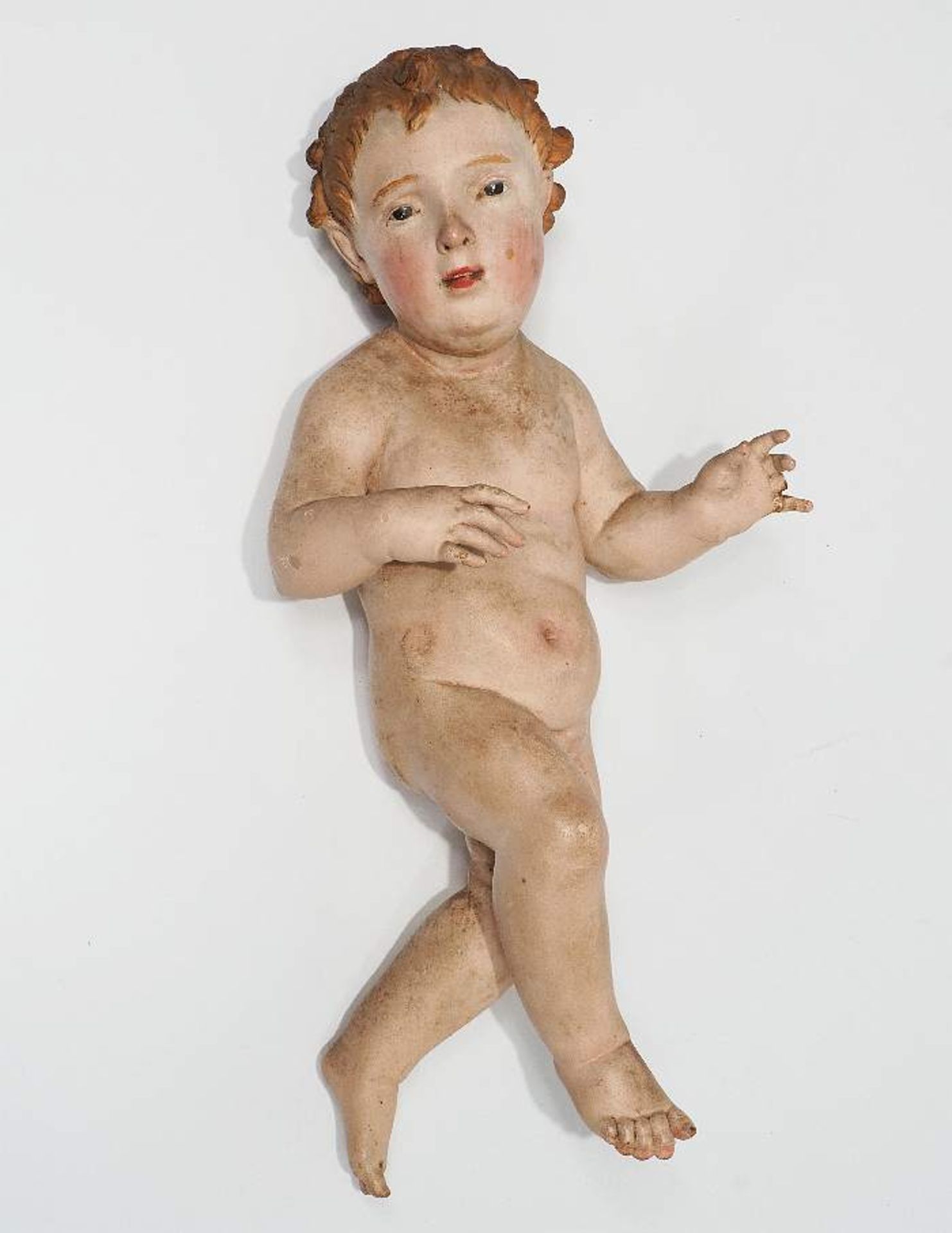 Krippenfigur Christusknabe/ Christuskind. Neapel um 1820/40. Holz, vollplastisch geschnitzt,