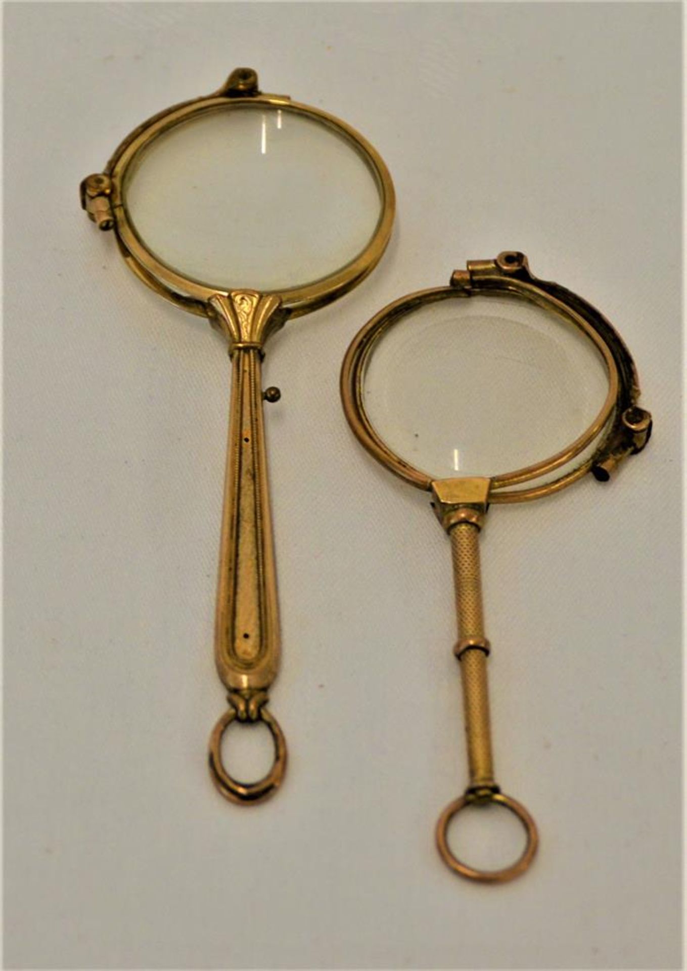 Konvolut 2 vergoldete Lorgnette, bei einem fehlt ein Glas