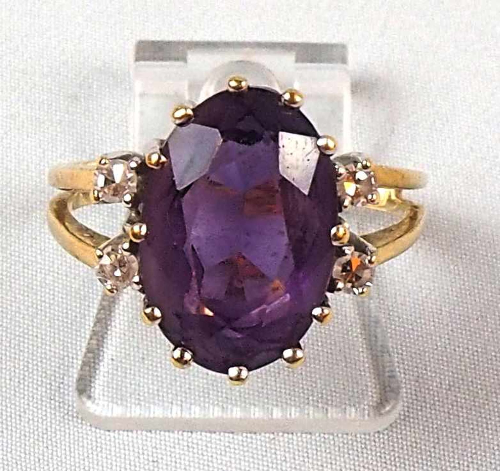 1 DamenringGG/WG 14ct. Amethyst Brill. **s. Abb.**