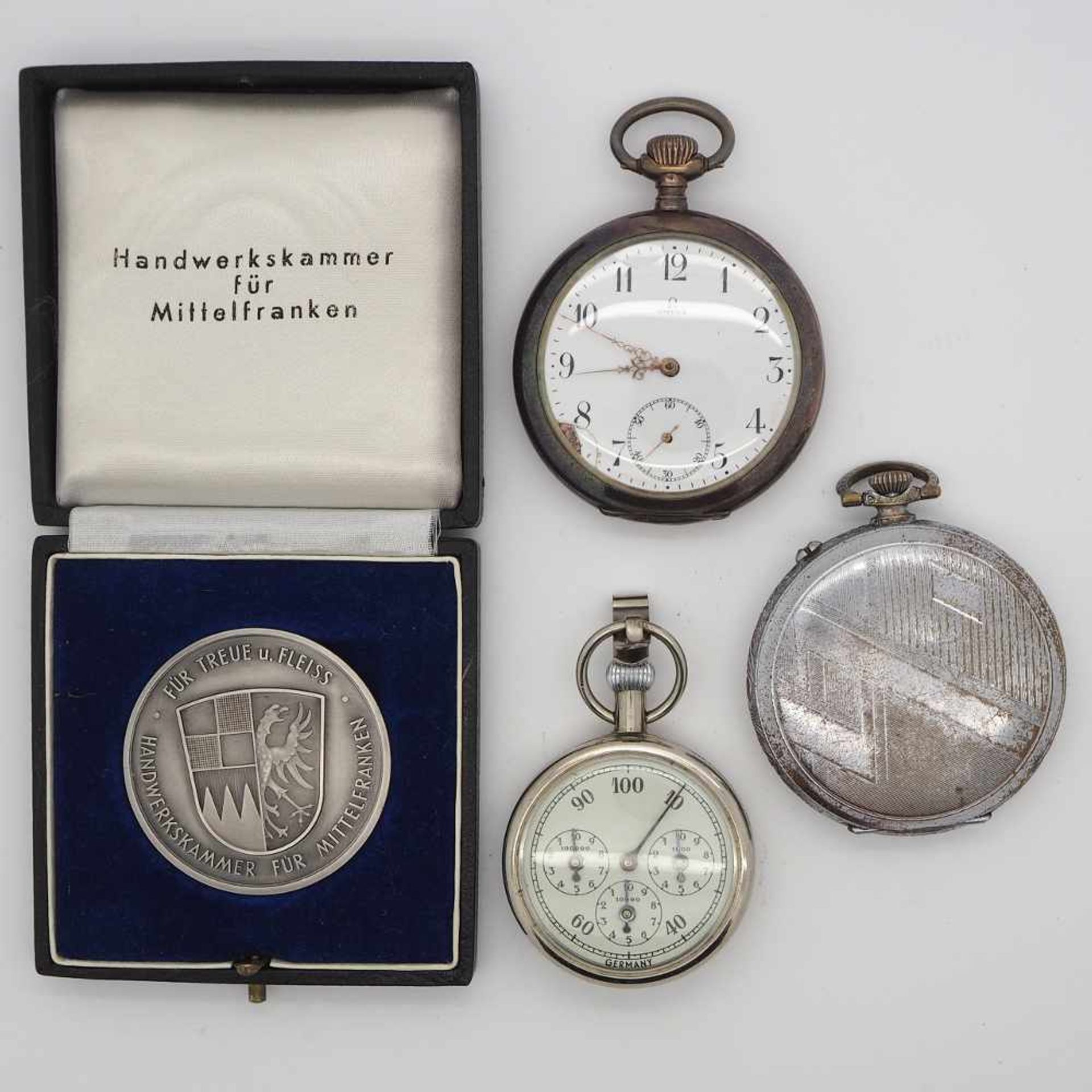 1 Taschenuhr Si. 800 OMEGA1 Taschenuhr 1 Stoppuhr Metall, 1 Medaille "Handwerkskammer Mittelfranken"