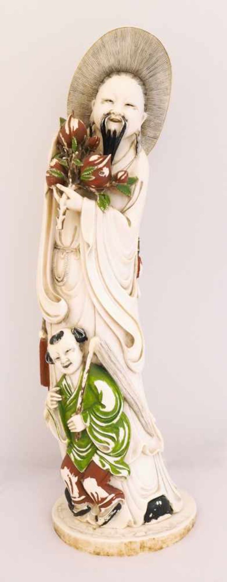 Figur Elfenbein geschnitzt z.T. bemaltHöhe ca. 42cm, min. besch. Farbverluste, Teile lose, vor 1970,