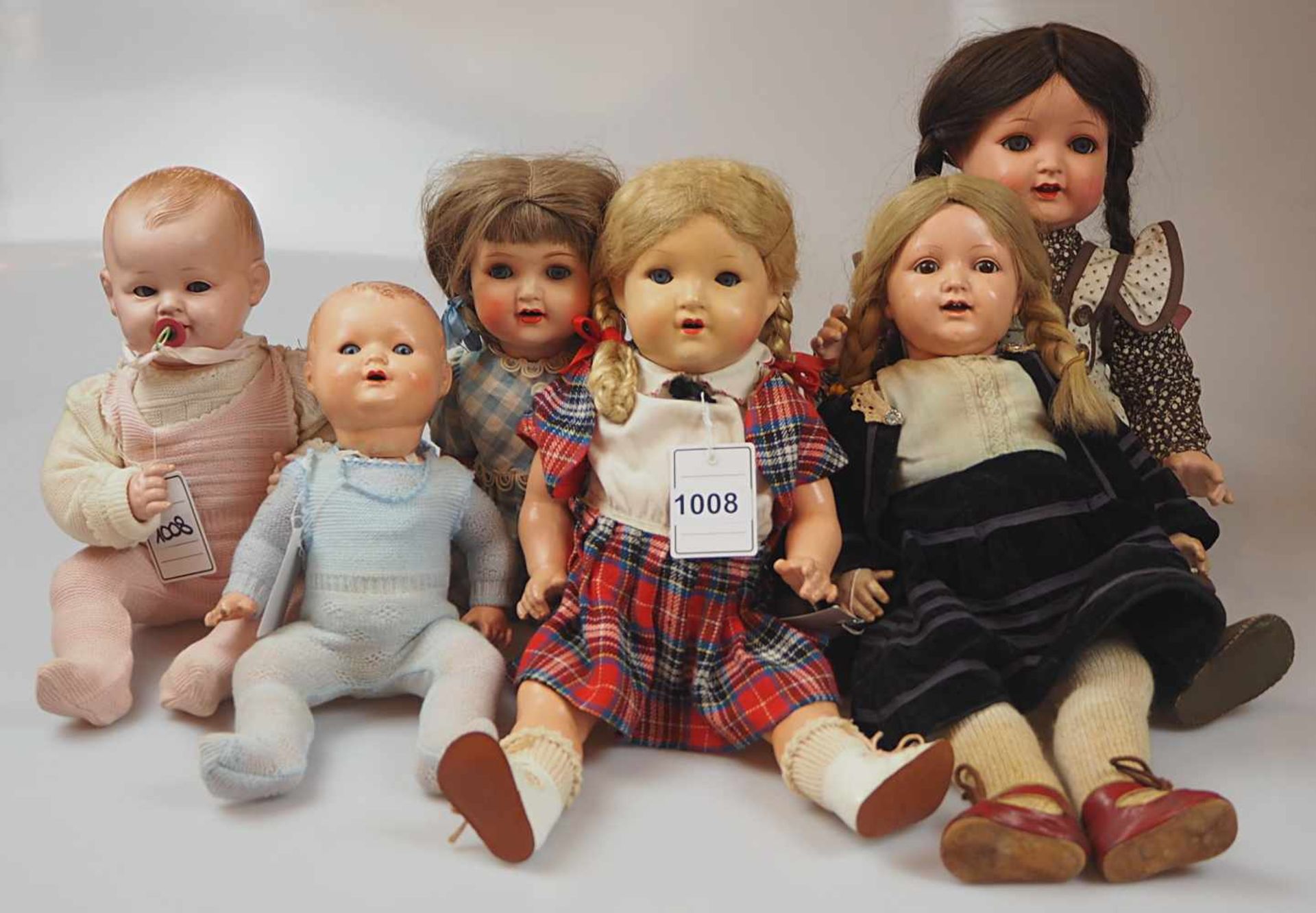6 Puppen z.T. mit Porzellankopf, z.T. um 1900 versch. Markenz.B. ARMAND MARSEILLE, KÄMMER &