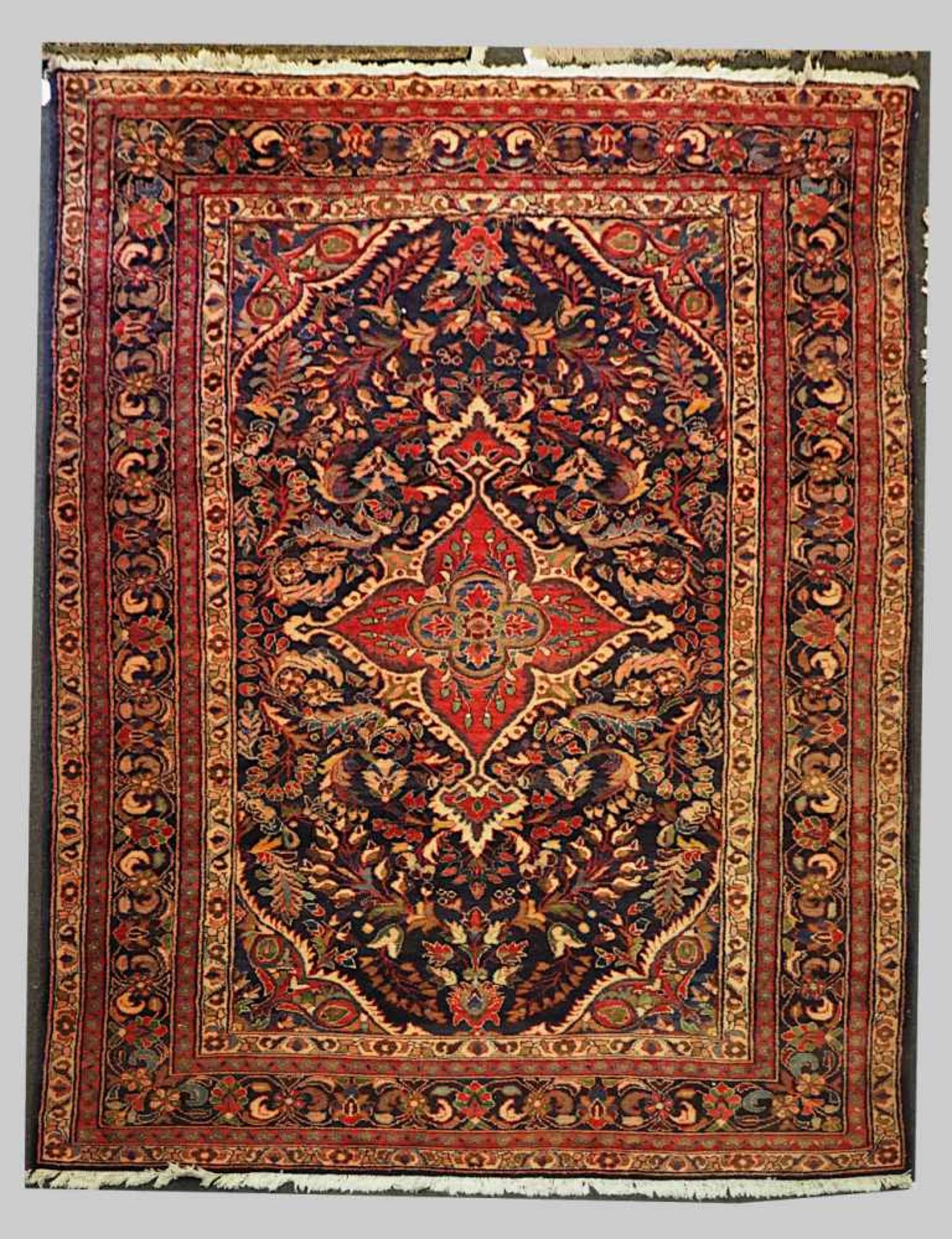 1 Orientteppich blau-/rotgrundigfloraler Dekor Mehrfachbordüre ca. 270x230cm Asp.