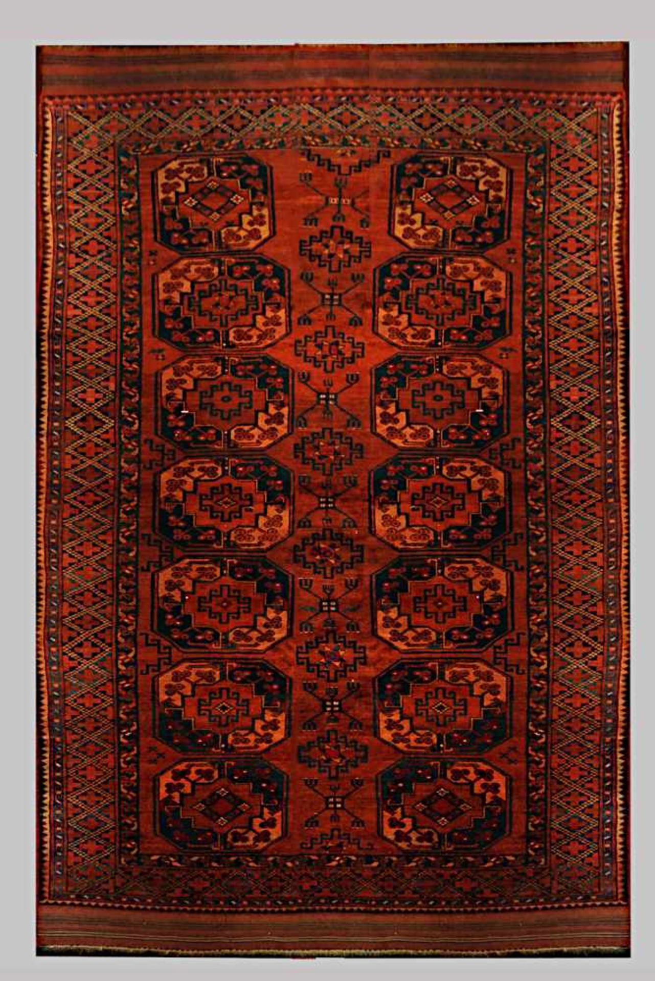 1 Orientteppich wohl Afghanistan rotgrundiggeometrischer Dekor ca. 330x245cm Fransen b