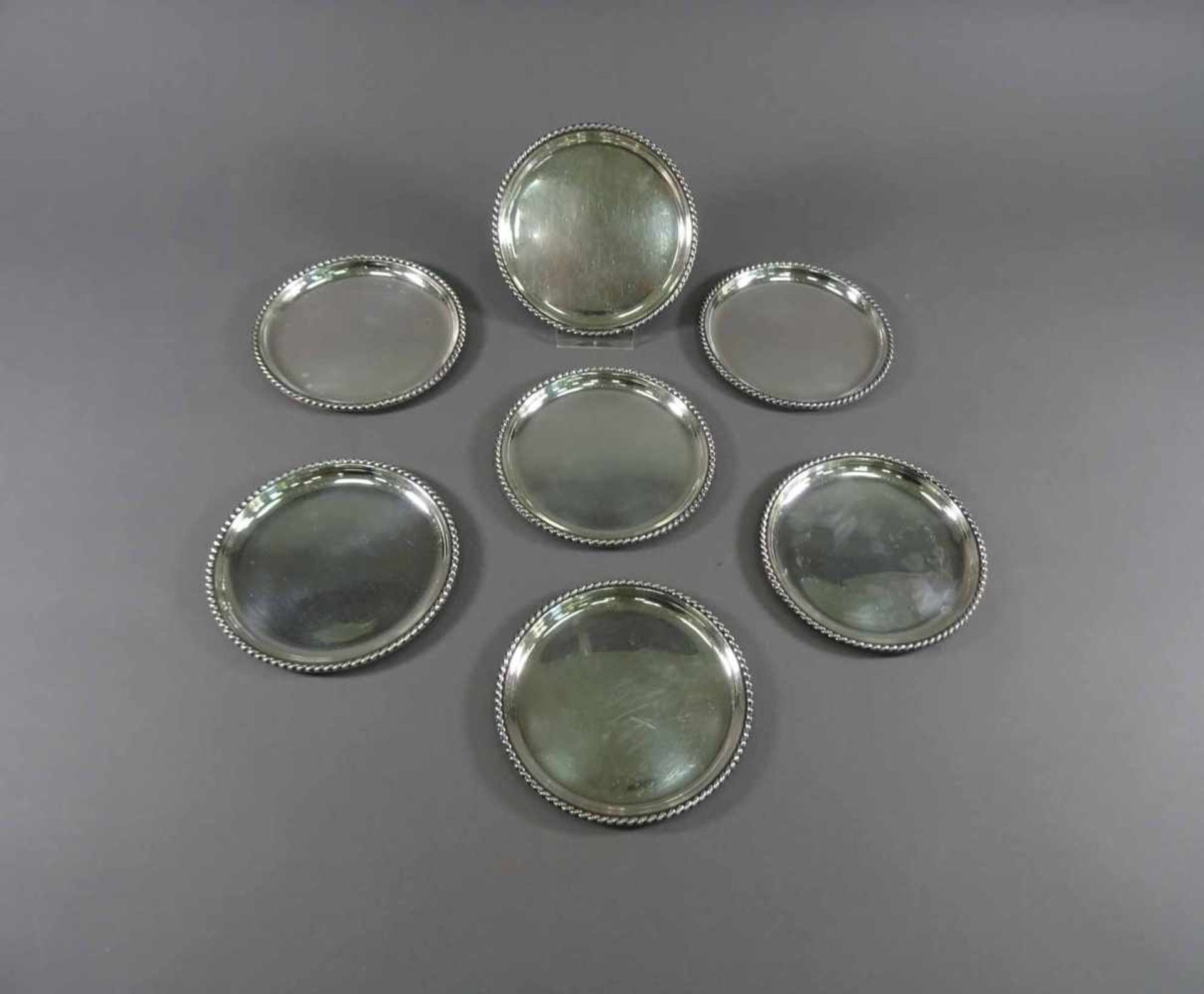 Sieben Gläseruntersetzer, 925 SilberJakob Grimminger, Schwäbisch Gmünd, Kordelrand, D = 11,0 cm, ca.