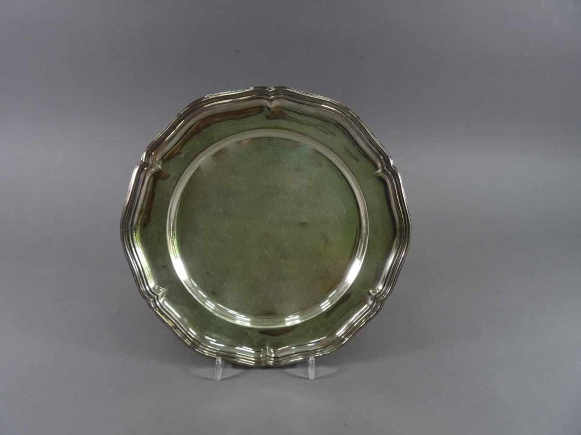Teller, 835 Silber, RillenrandD = 23 cm, ca. 160 g, Kratzspuren