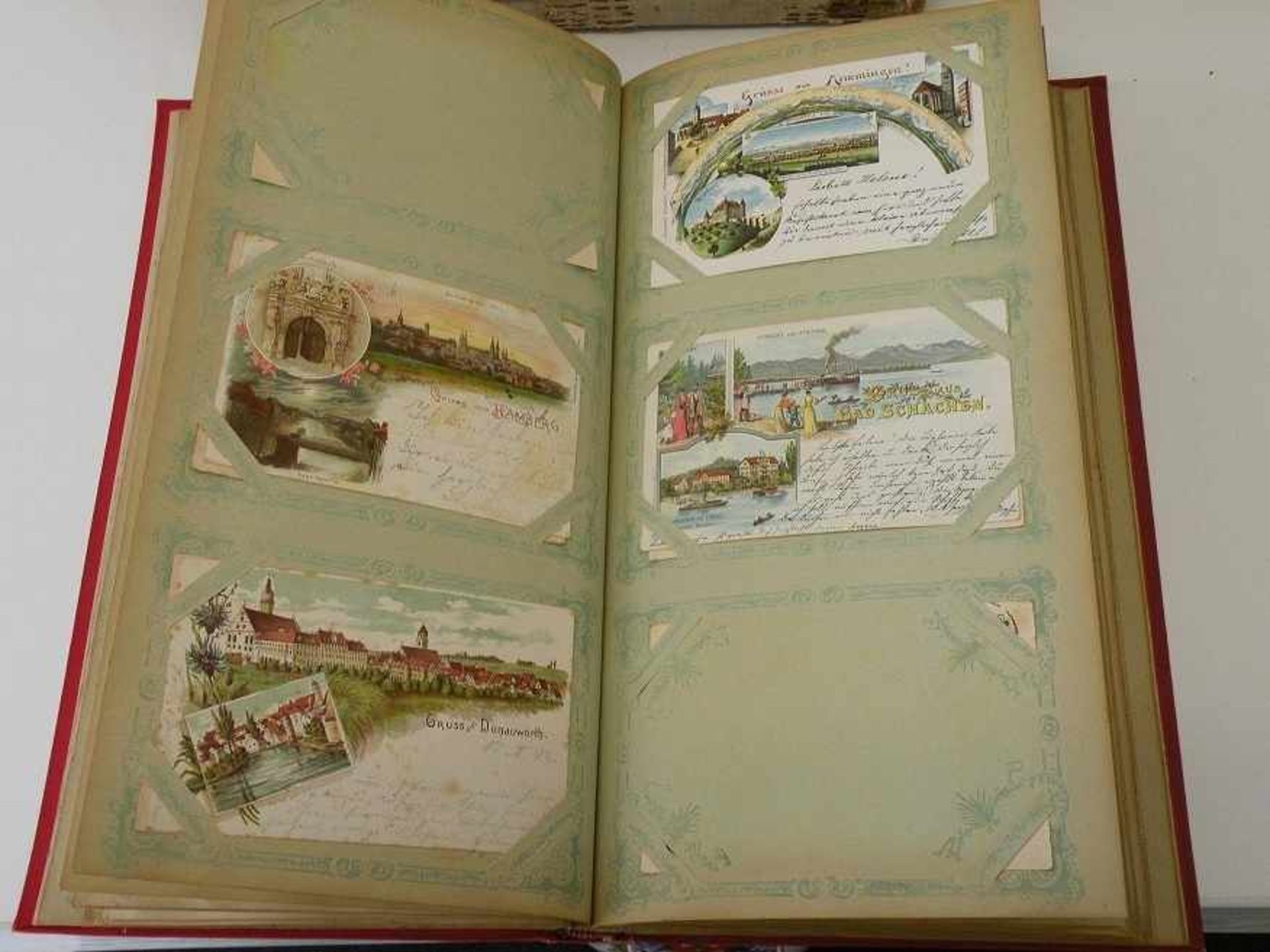 Postkartenalbum um 1900, mit zahlreichen Lithos