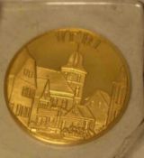 Verl in Westfalen, Medaille, Gold 986. Durchmesser: 1,8cm, 4,3 Gramm.