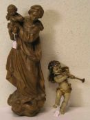 "Madonna mit Kind". Holz geschnitzt, Höhe: 39cm. Dazu: "Geflügelter Engel mit Posaune".