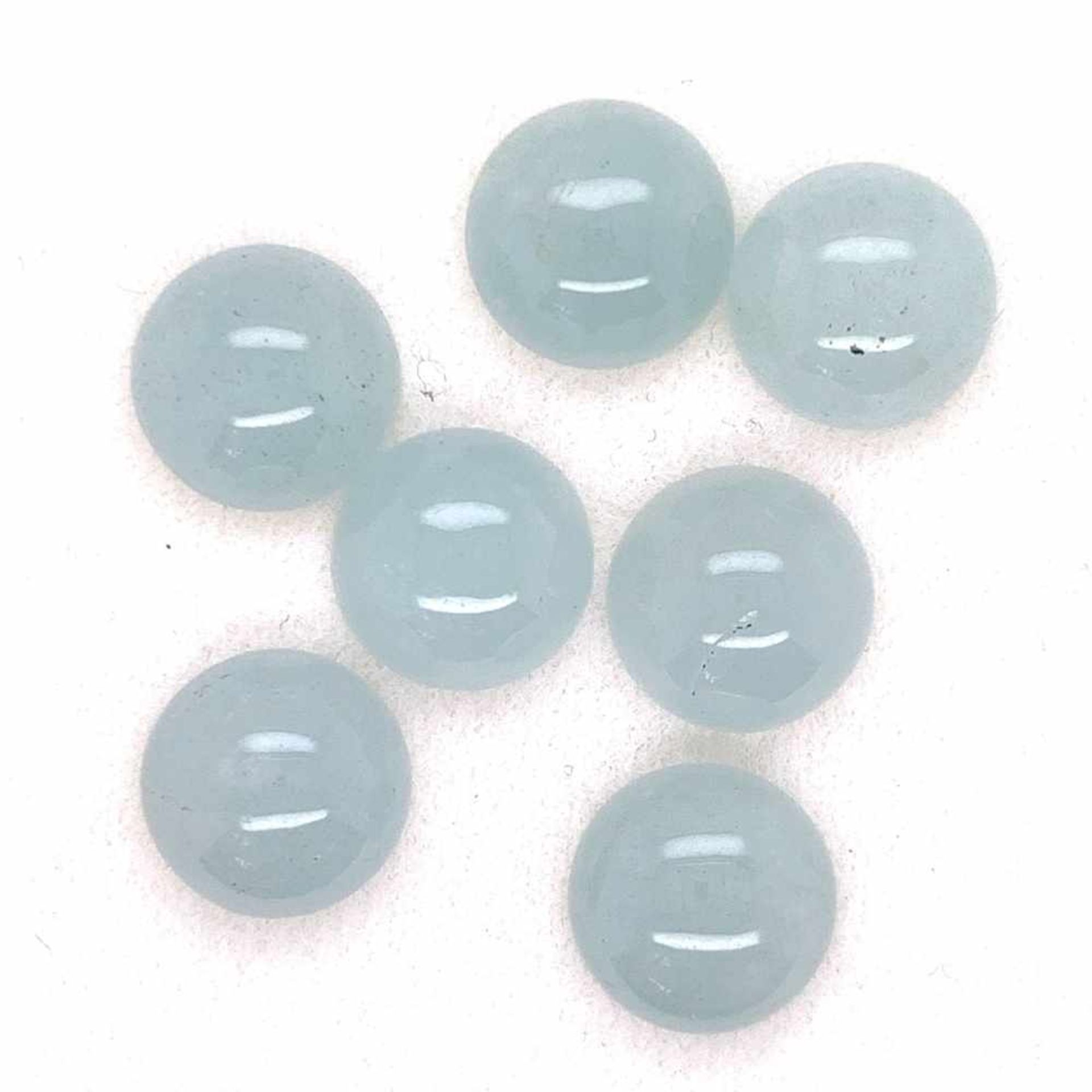 Aquamarin Lot. Aquamarine Cabochon rund 42,55 ct 7 Stück