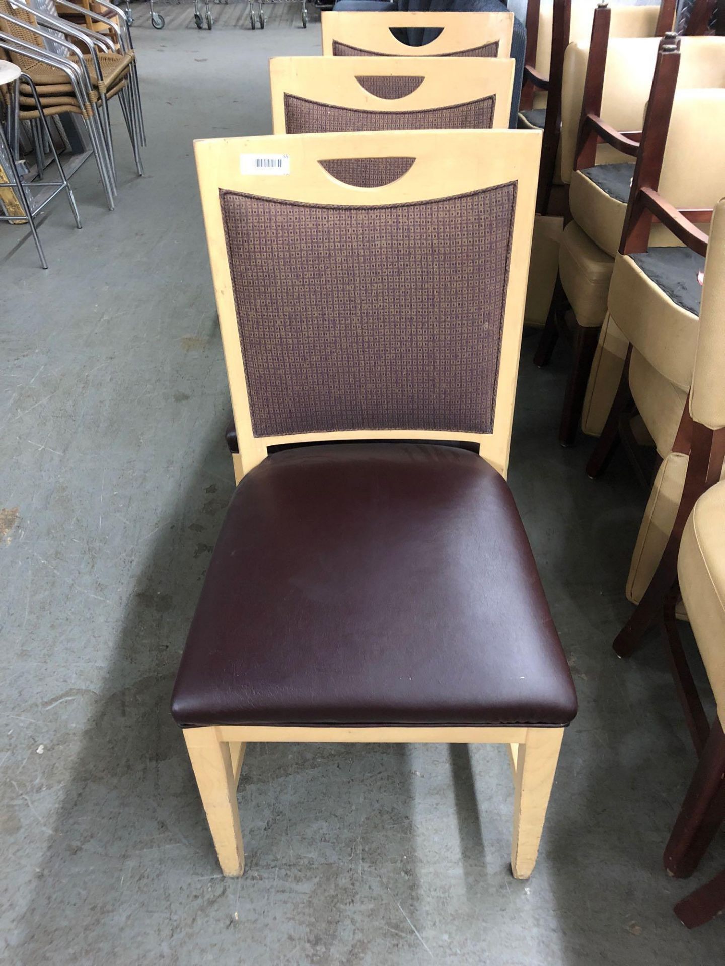 Wood chair with padded seat and back