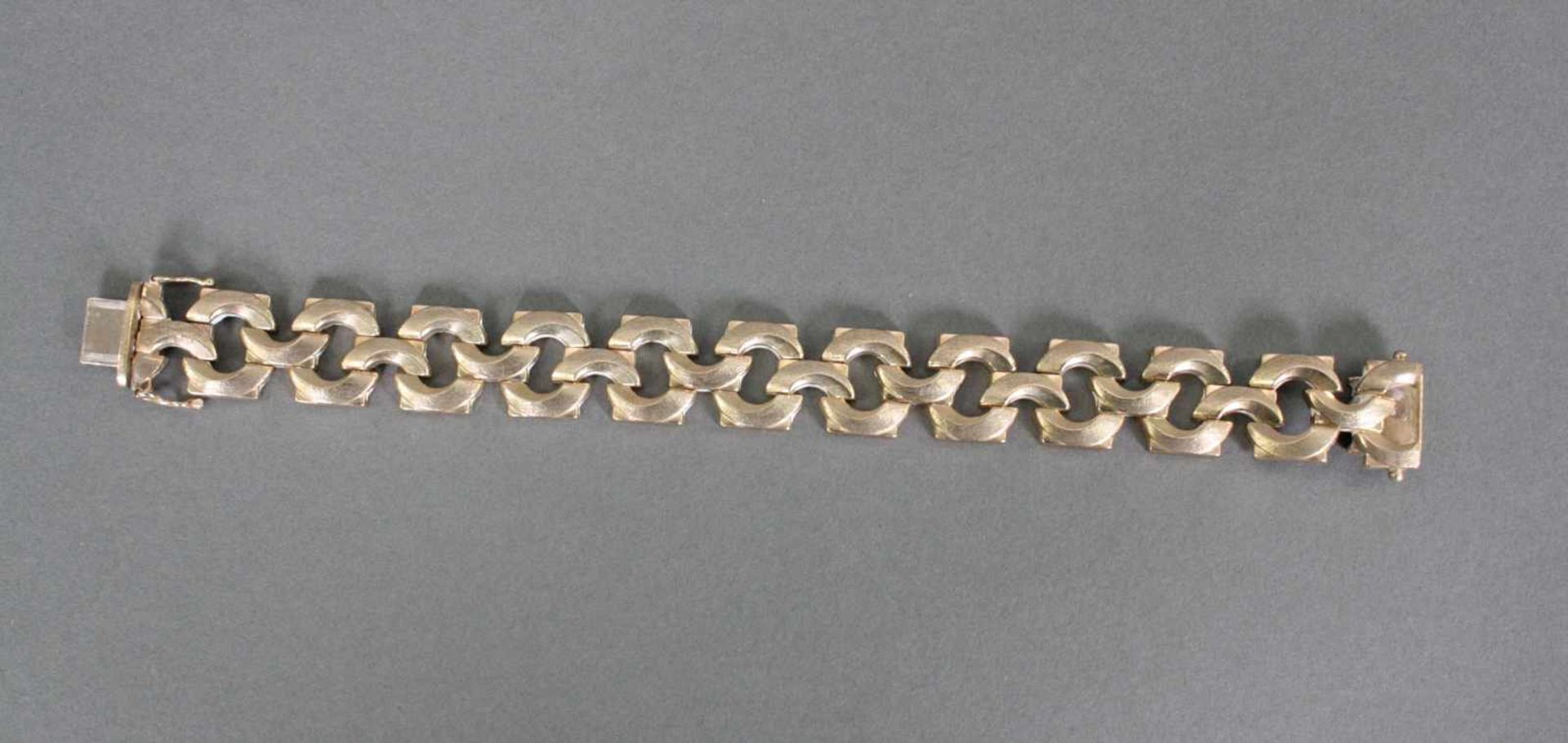 Damenarmband, 8 Karat GelbgoldGliederarmband, am Verschluss punziert 333, ca. Länge 19,5 cm, 25,4