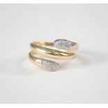 Damenring mit Diamanten in Schlangenform, 14 Karat GelbgoldRinggröße 58, 4,5 g.