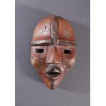 Afrikanische Maske, Baule, Elfenbeinküste 1. Hälfte 20. Jh.Holz geschnitzt, Narbenschmuck, ca. 6 x